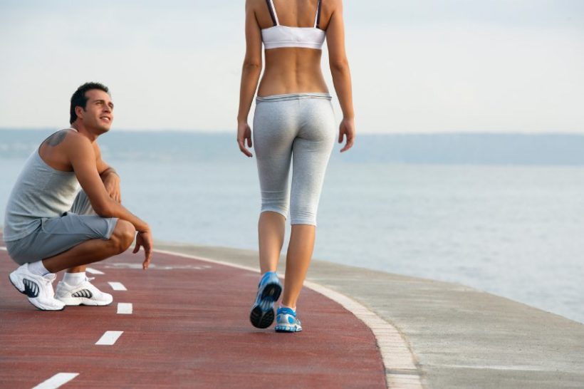 Couple Exercising Together --- Image by © MM Productions/Corbis